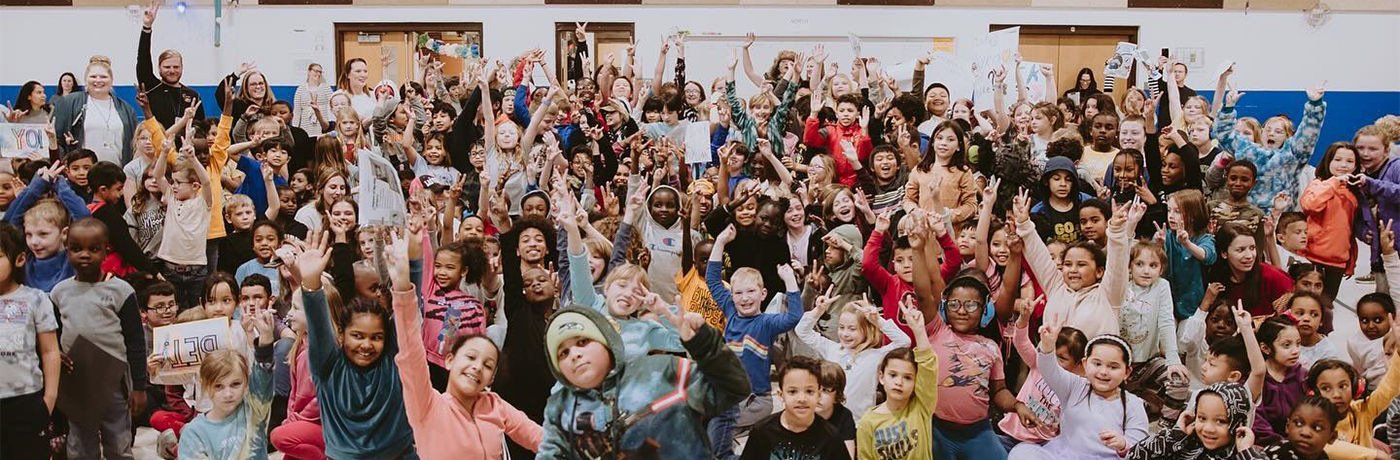 Students posing in a large group photo